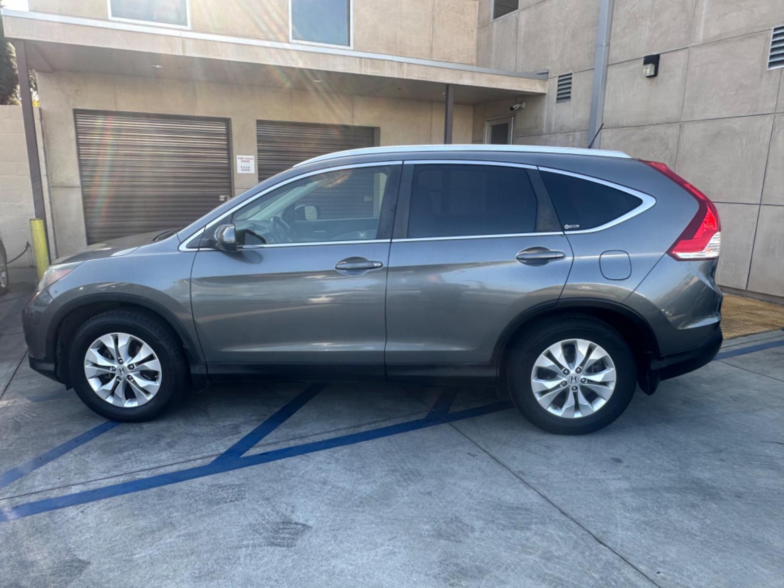 2012 Grey /Gray Honda CR-V EX-L 2WD 5-Speed AT (JHLRM3H78CC) with an 2.4L L4 DOHC 16V engine, 5-Speed Automatic transmission, located at 30 S. Berkeley Avenue, Pasadena, CA, 91107, (626) 248-7567, 34.145447, -118.109398 - Moon-roof! Leather seats! This 2012 Honda CR-V EX-L 2WD 5-Speed AT looks and drives good. - Photo #1